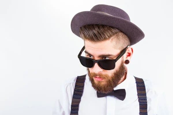 how long after a hair transplant can i wear a hat - man wearing hat
